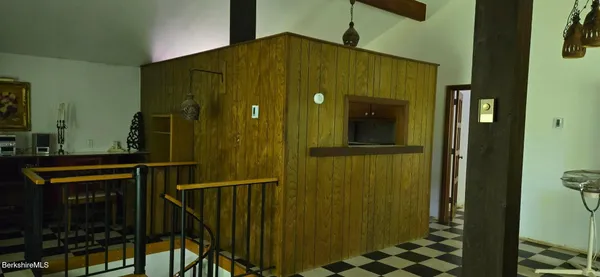 a bathroom with a shower and a sink