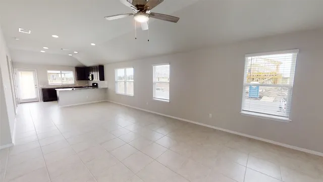 a black and white photo of a white wall with black and white painting