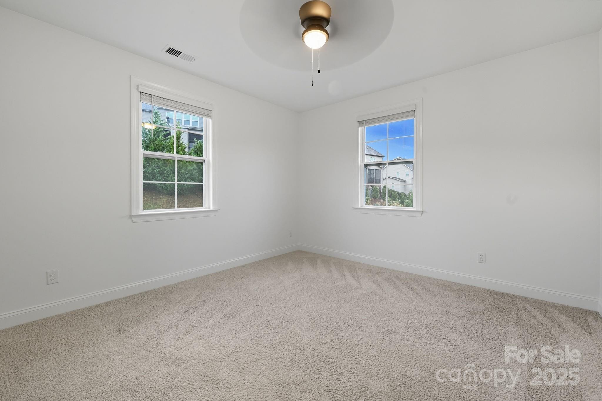 425 Cassia Court Tega Cay, SC 29708 - Photo 19 of 39 an empty room with a window