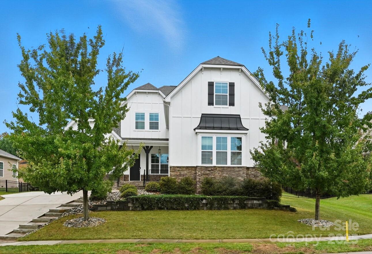 425 Cassia Court Tega Cay, SC 29708 - Photo 25 of 39 a front view of a house with a yard