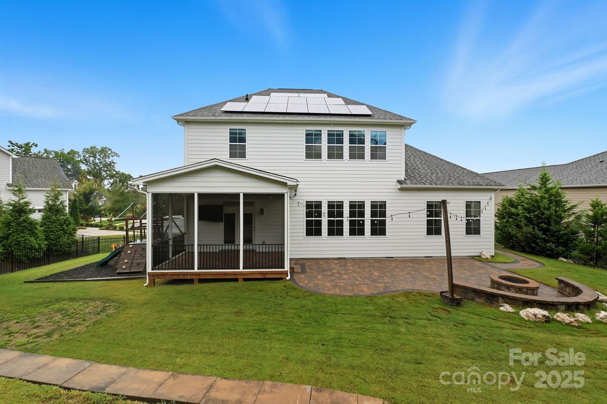 425 Cassia Court Tega Cay, SC 29708 - Photo 7 of 39 a front view of a house with a yard