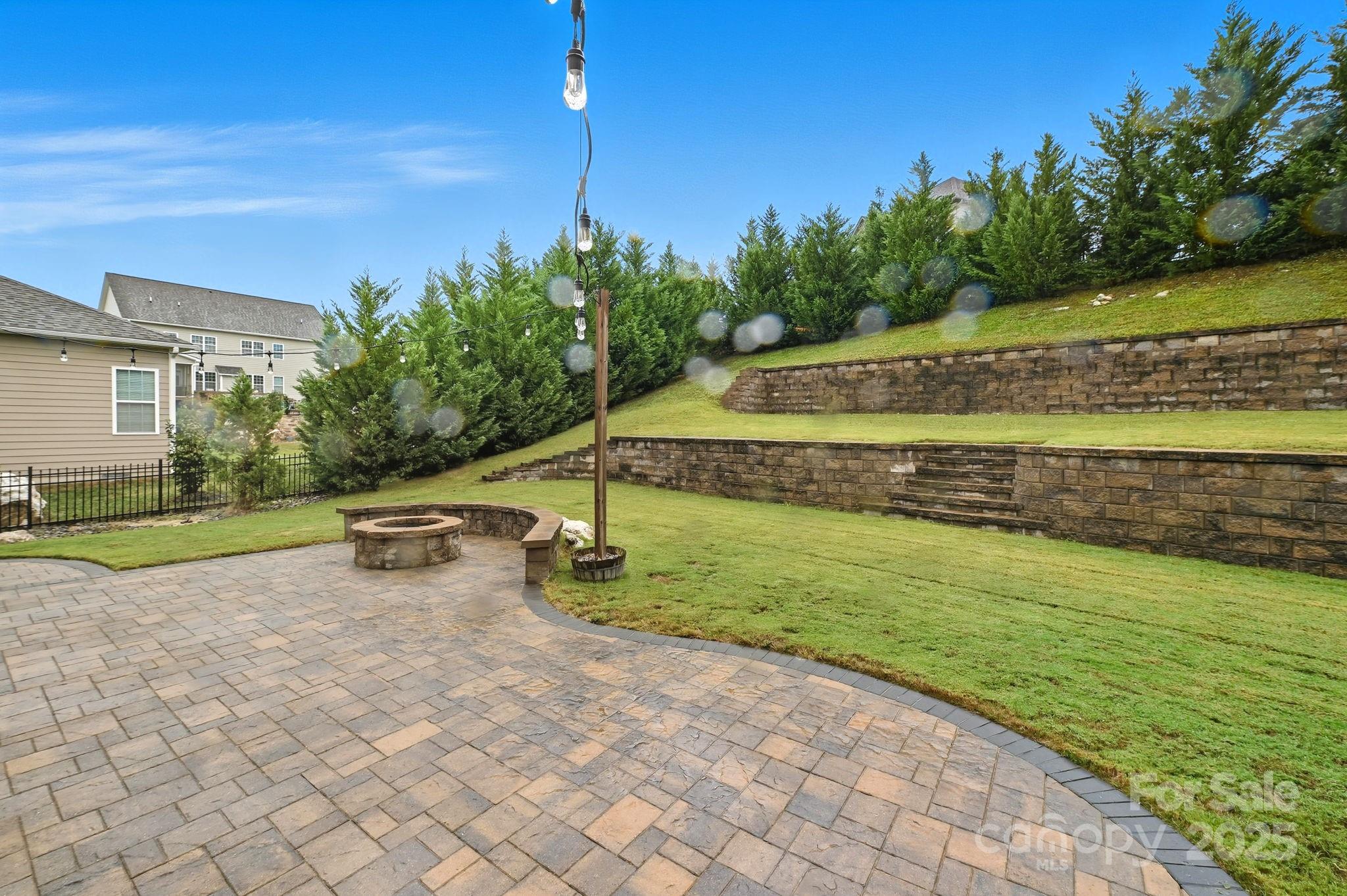 425 Cassia Court Tega Cay, SC 29708 - Photo 9 of 39 a view of a swimming pool with a yard