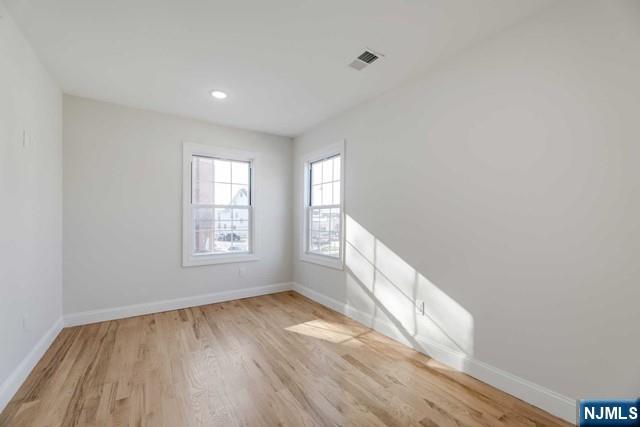 401 Franklin Street, Unit 2 Bloomfield, NJ 07003 - Photo 10 of 13 a view of an empty room and a window