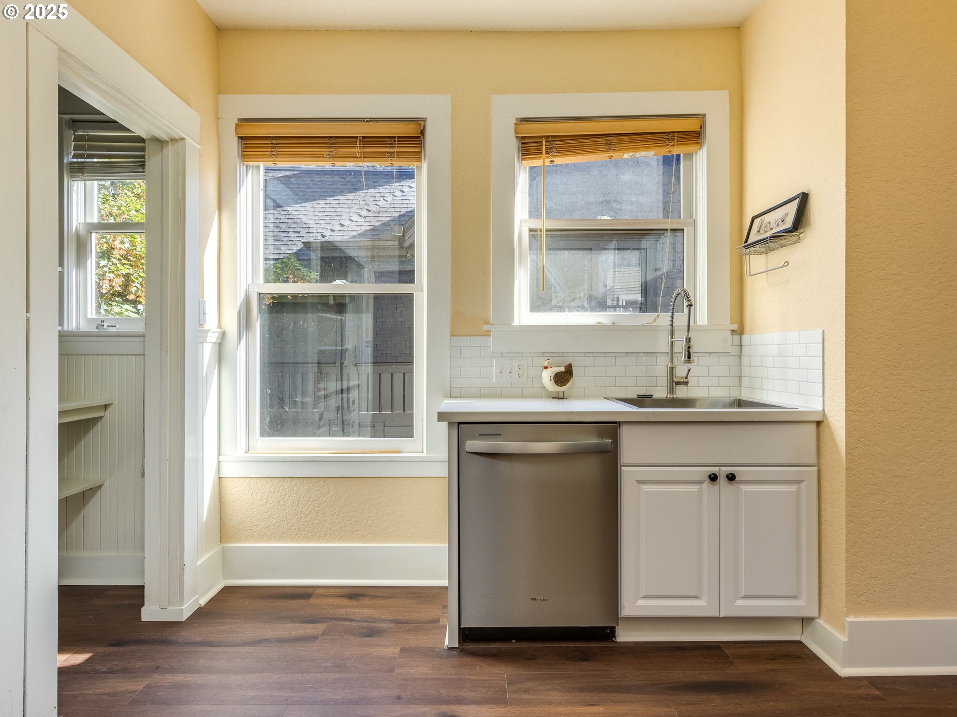 2137 Northwest Everett Street, Unit B Portland, OR 97210 - Photo 16 of 28 a bathroom with a sink and a large mirror