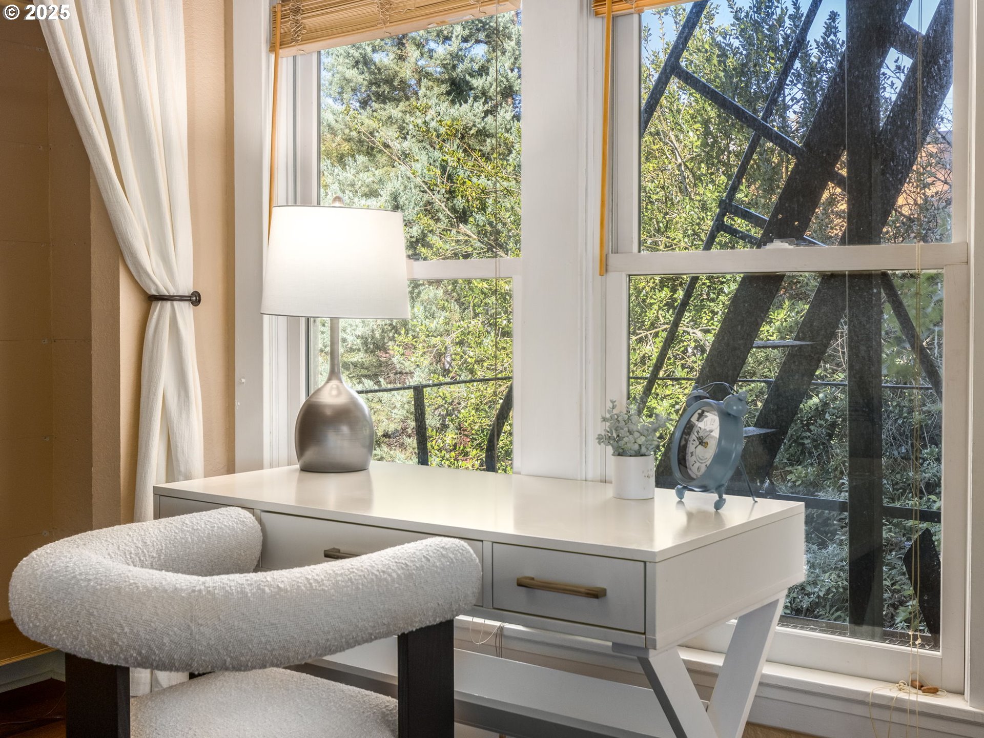 2137 Northwest Everett Street, Unit B Portland, OR 97210 - Photo 20 of 28 a living room with furniture and a floor to ceiling window