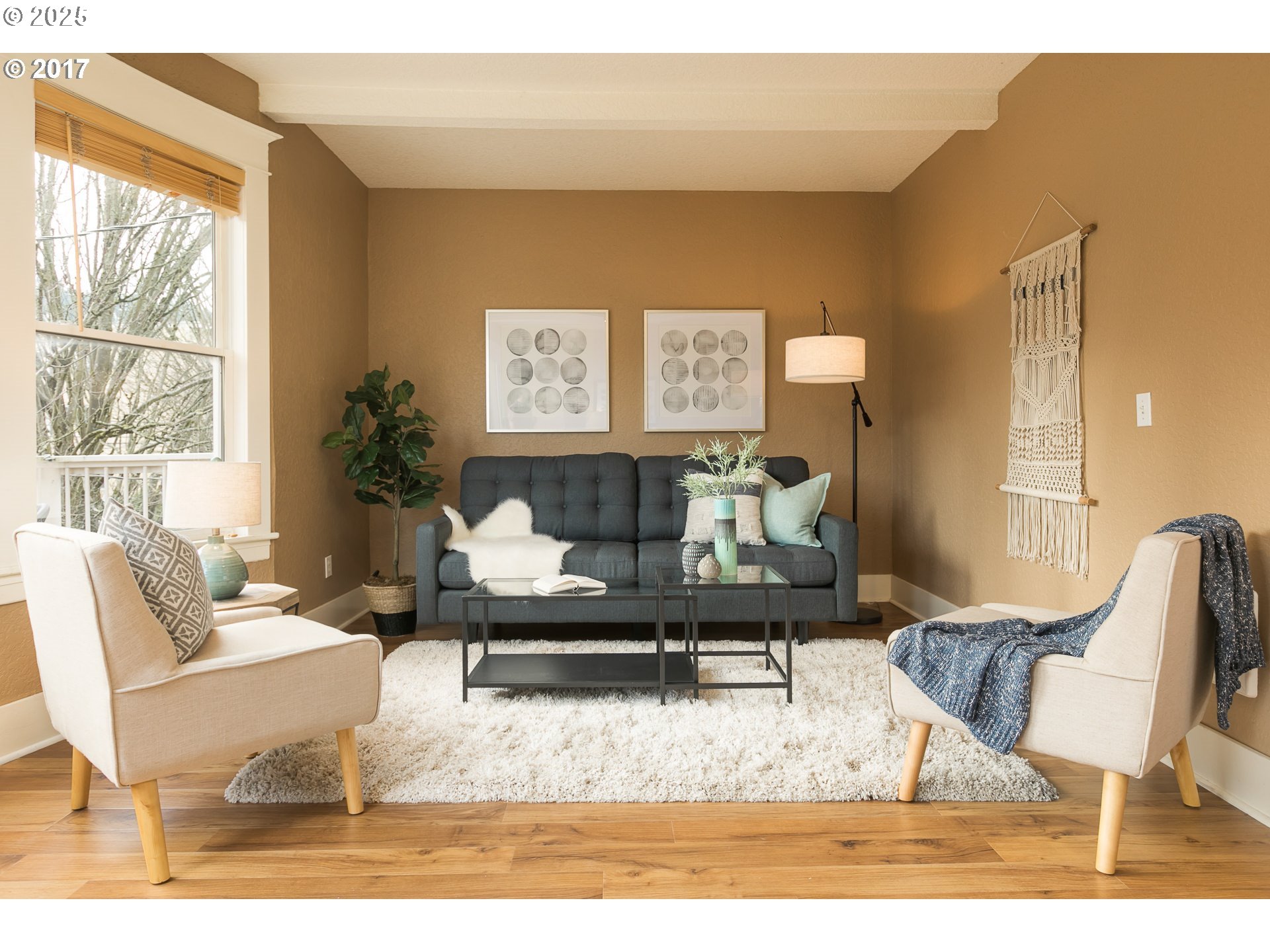 2137 Northwest Everett Street, Unit B Portland, OR 97210 - Photo 2 of 28 a living room with furniture wooden floor and a large window