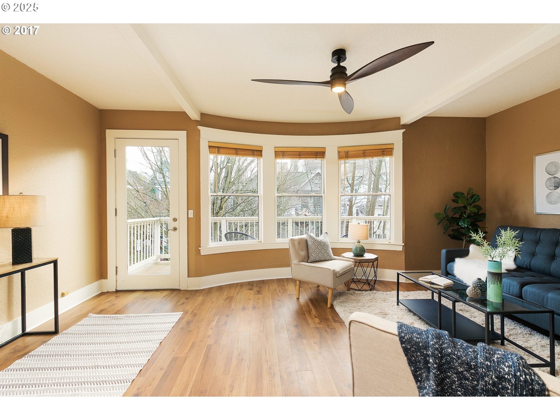 2137 Northwest Everett Street, Unit B Portland, OR 97210 - Photo 3 of 28 a living room with furniture and a large window