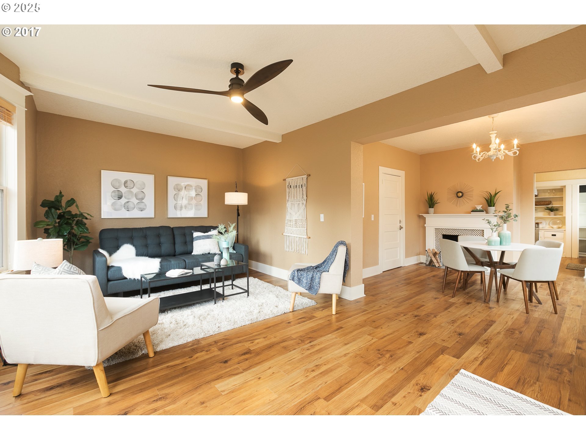 2137 Northwest Everett Street, Unit B Portland, OR 97210 - Photo 5 of 28 a living room with furniture and a wooden floor