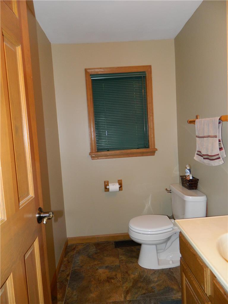 328 Pin Oak Road Stroudsburg, PA 18360 - Photo 19 of 37 A window offers natural light in this well-appointed bathroom.
