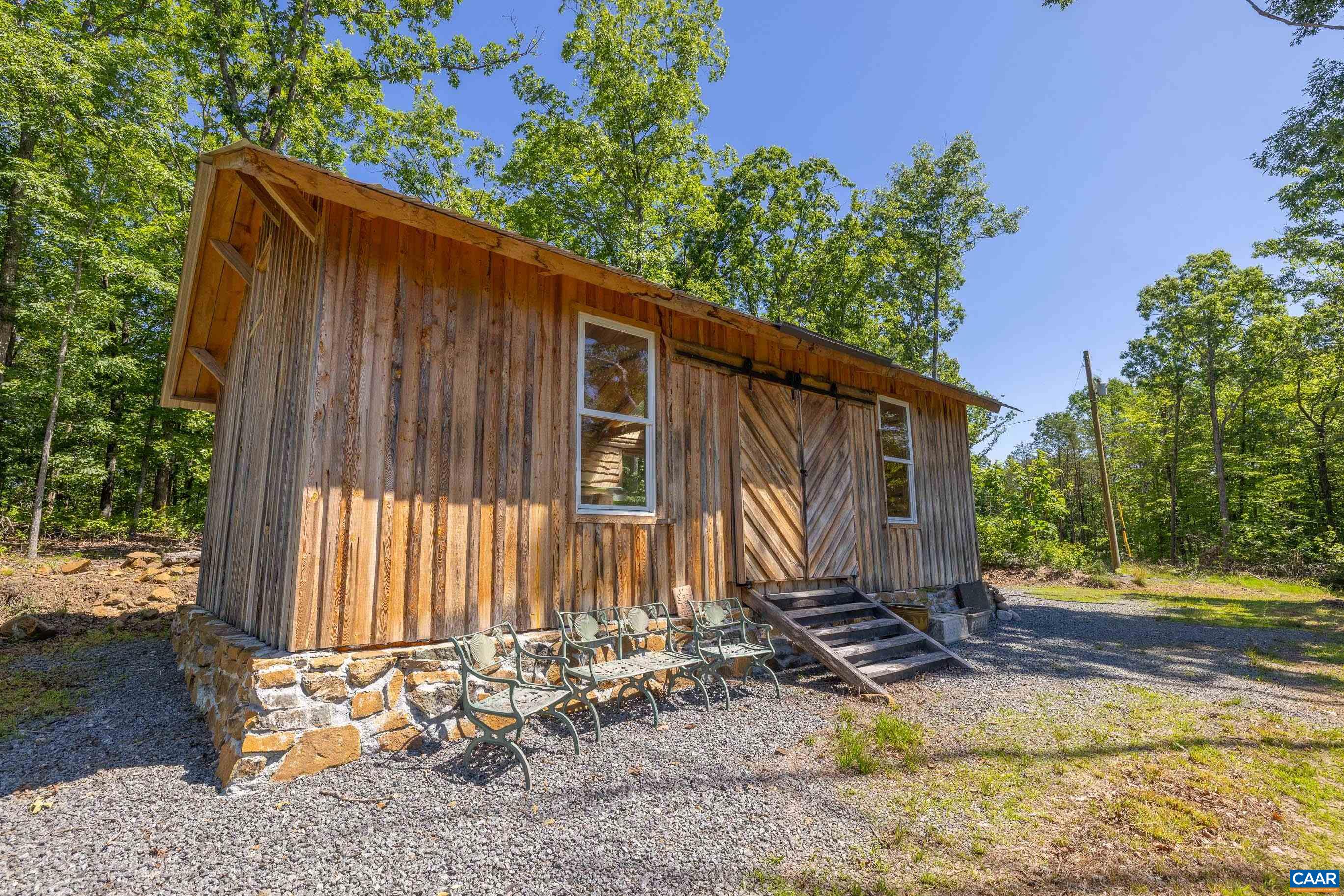 7676 Old Dominion Road Schuyler, VA 22969 - Photo 3 of 29 a view of a back yard of the house