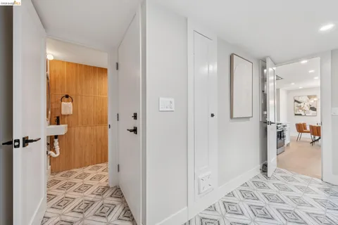 a bathroom with a shower and a sink