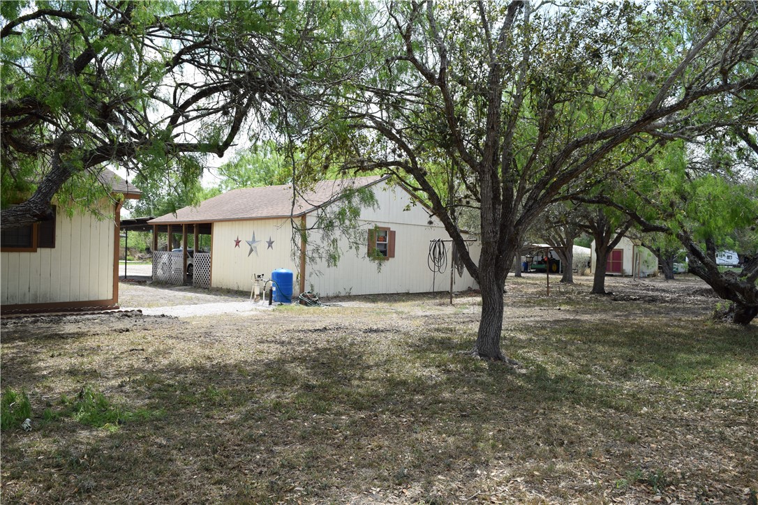 24772 County Road 360 Mathis, TX 78368 - Photo 19 of 30 a view of a house with a tree in the background