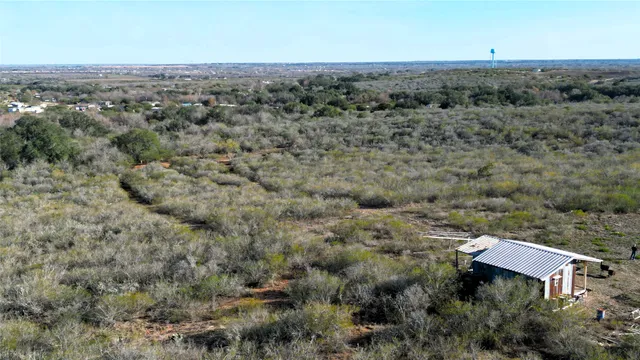 an aerial view of house with outdoor space