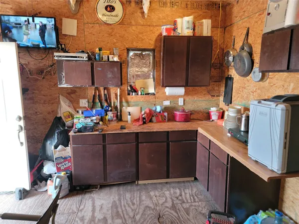 a bed room with a bed and a stove