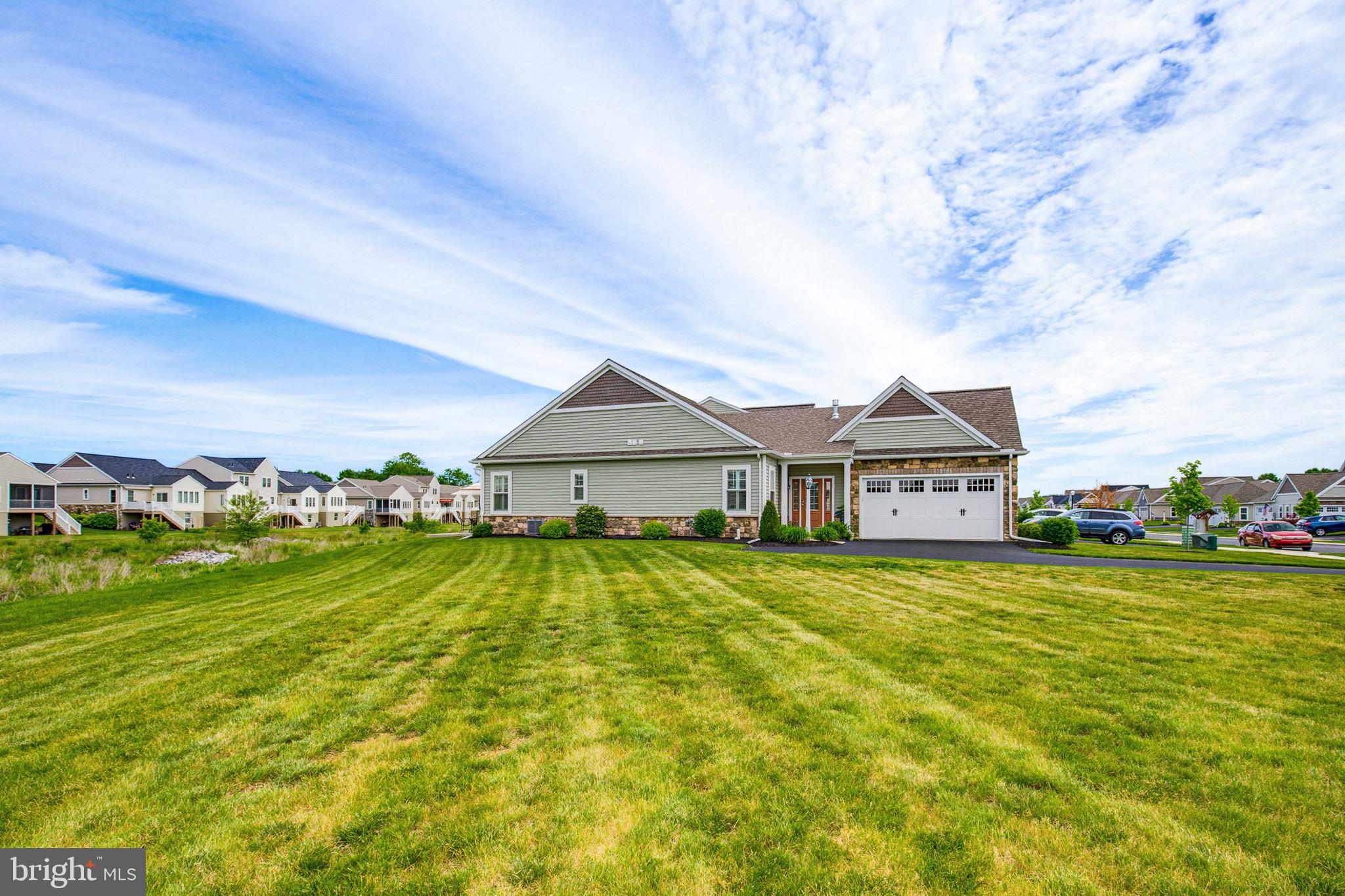 361 Meadow Rose Drive Lititz, PA 17543 - Photo 35 of 39 a view of a big house with a big yard and large trees