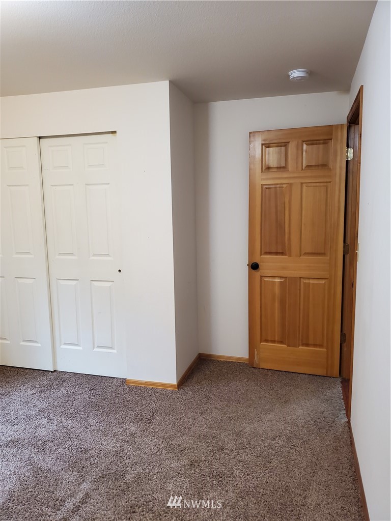 541 East Coulter Creek Road Belfair, WA 98528 - Photo 26 of 39 a view of an empty room