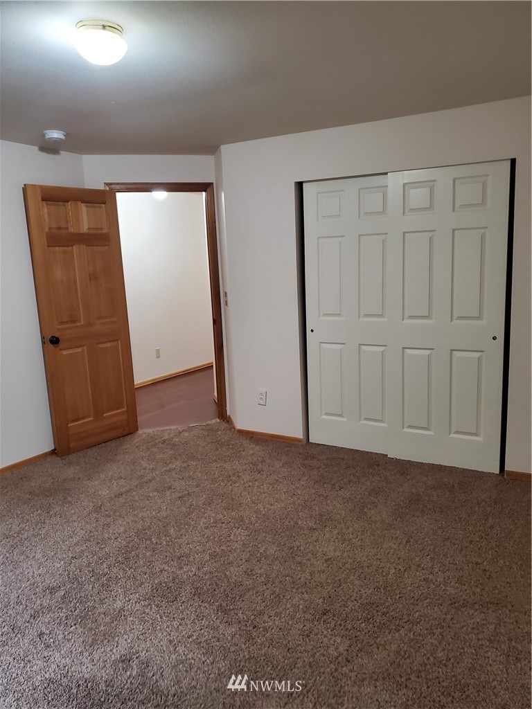 541 East Coulter Creek Road Belfair, WA 98528 - Photo 28 of 39 an empty room with closet