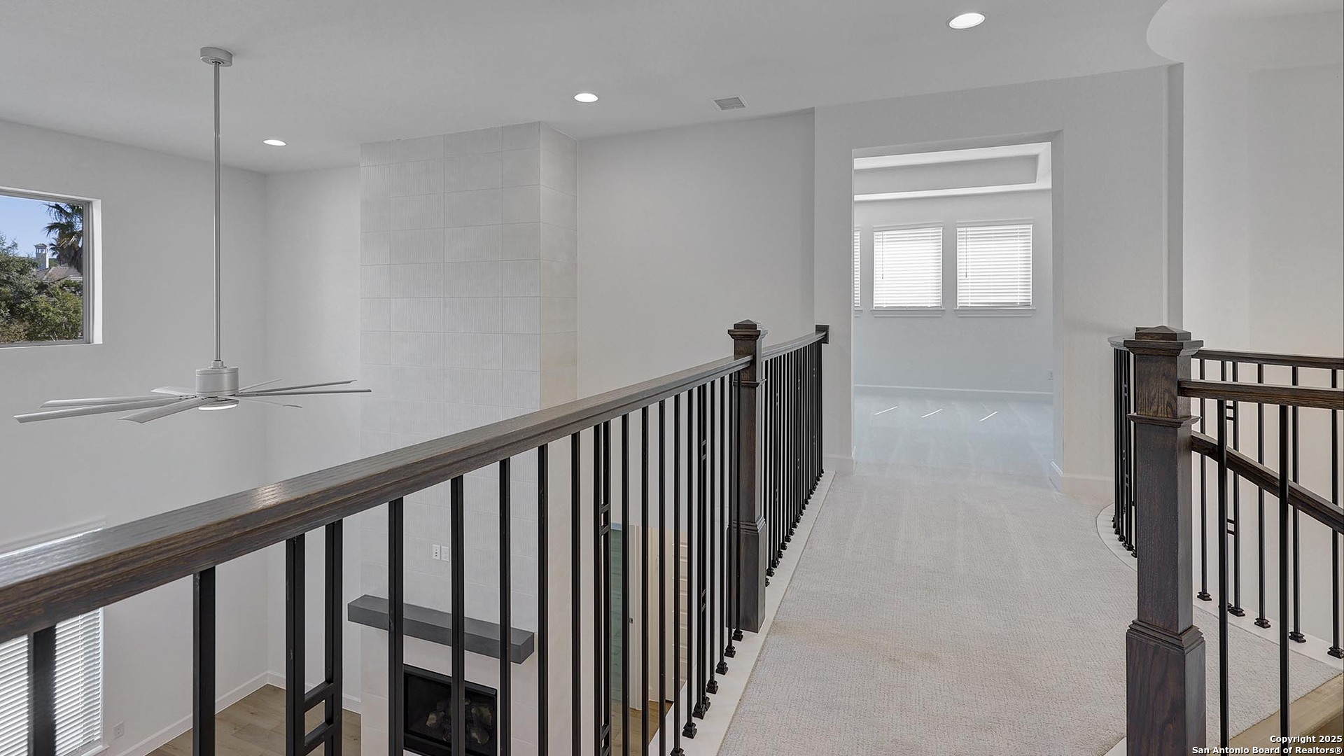 30 Enia Circle San Antonio, TX 78257 - Photo 18 of 27 a view of a hallway with windows