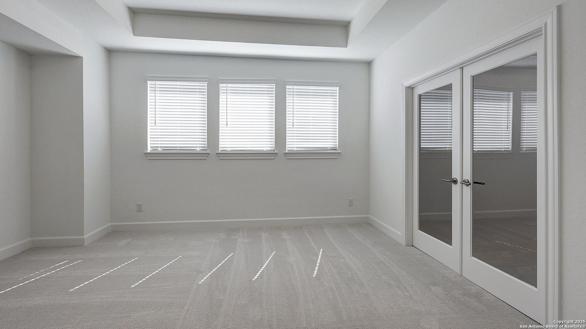 30 Enia Circle San Antonio, TX 78257 - Photo 19 of 27 a view of an empty room with a window