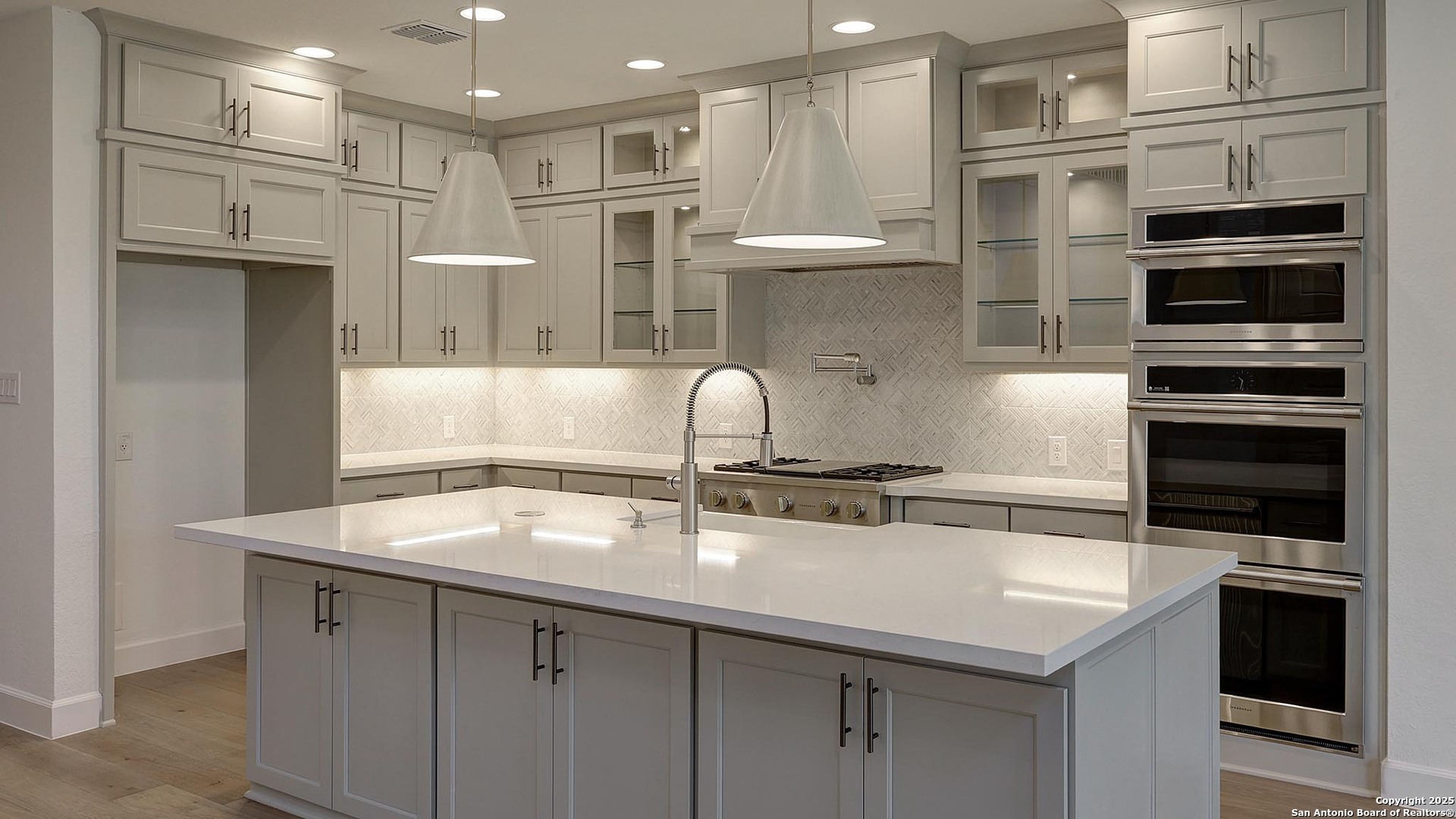30 Enia Circle San Antonio, TX 78257 - Photo 2 of 27 a kitchen with stainless steel appliances a sink stove and refrigerator