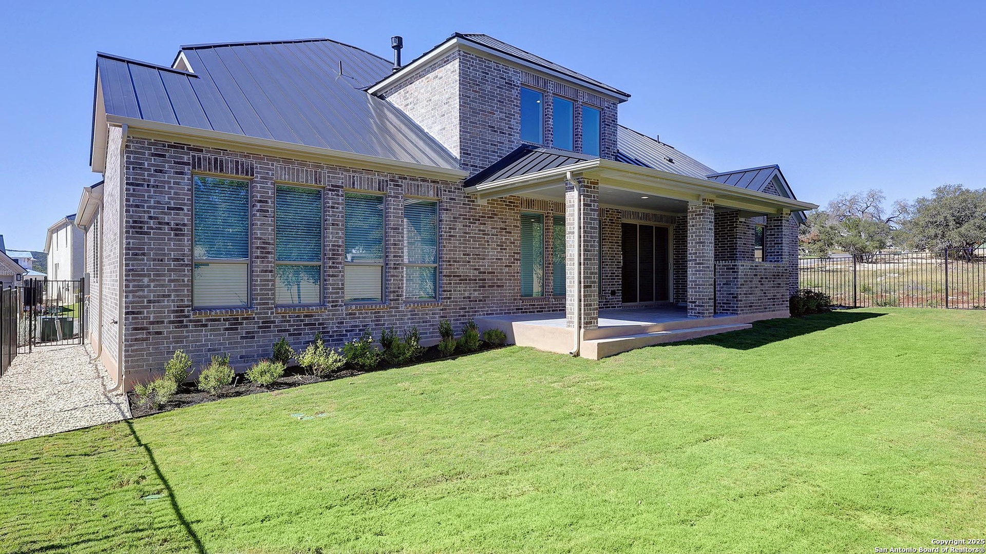 30 Enia Circle San Antonio, TX 78257 - Photo 23 of 27 a view of a house with a garden