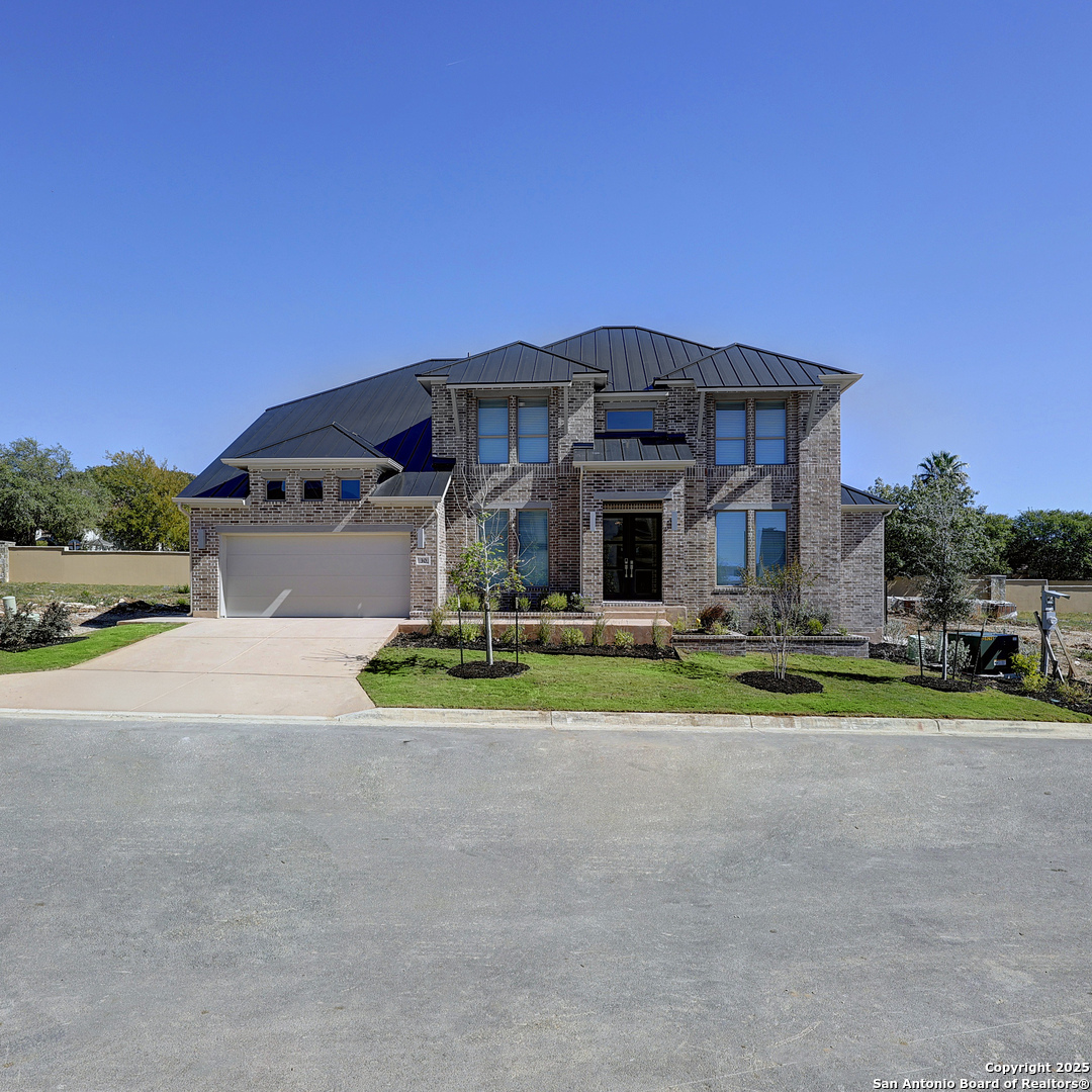 30 Enia Circle San Antonio, TX 78257 - Photo 25 of 27 a house view with a sitting space and garden