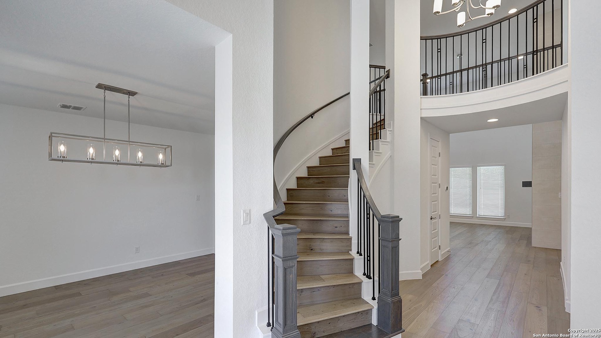 30 Enia Circle San Antonio, TX 78257 - Photo 8 of 27 a view of a hallway with wooden floor and entryway