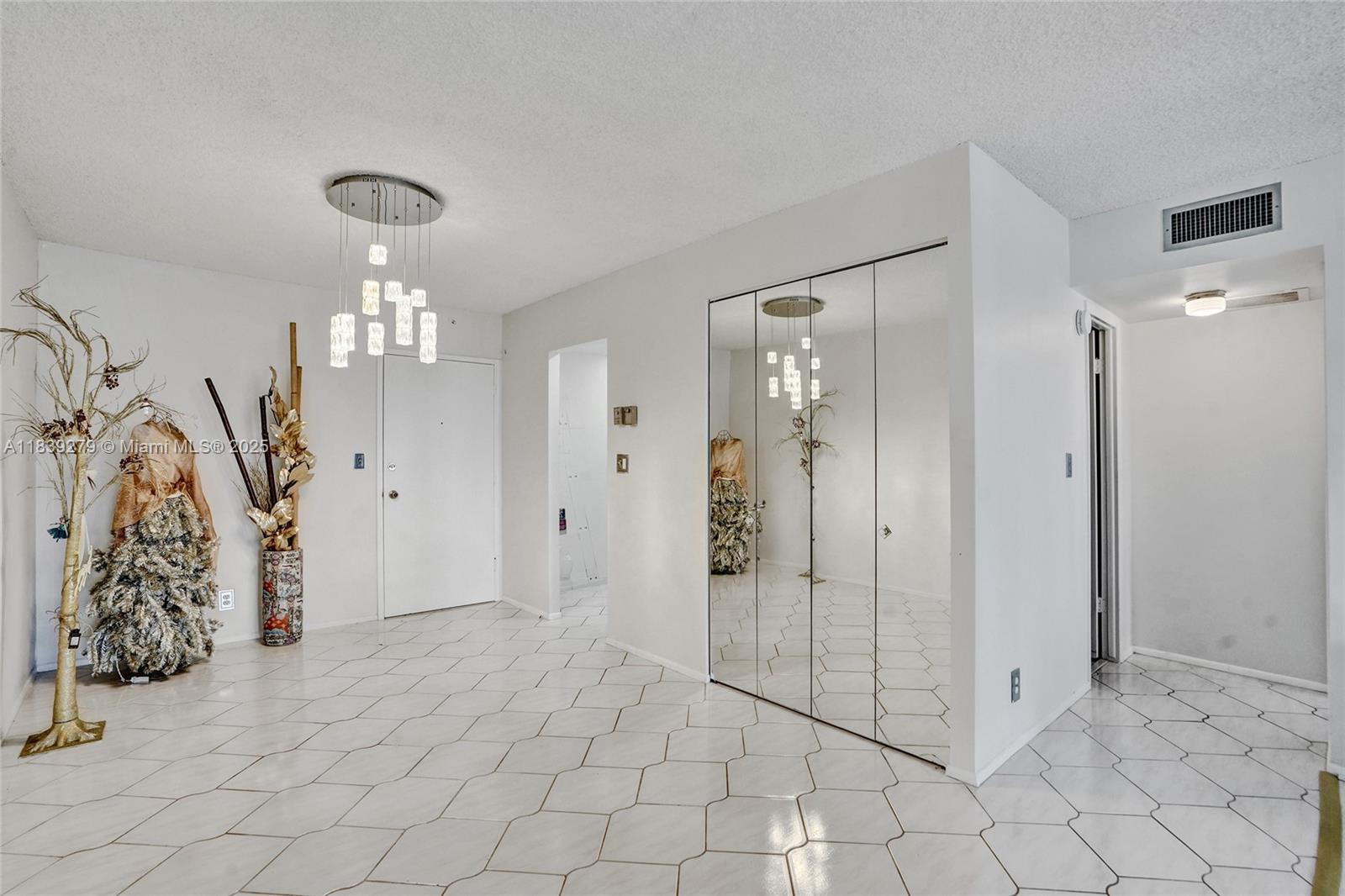 405 North Ocean Boulevard, Unit 815 Pompano Beach, FL 33062 - Photo 13 of 41 a view of a bathroom with mirror