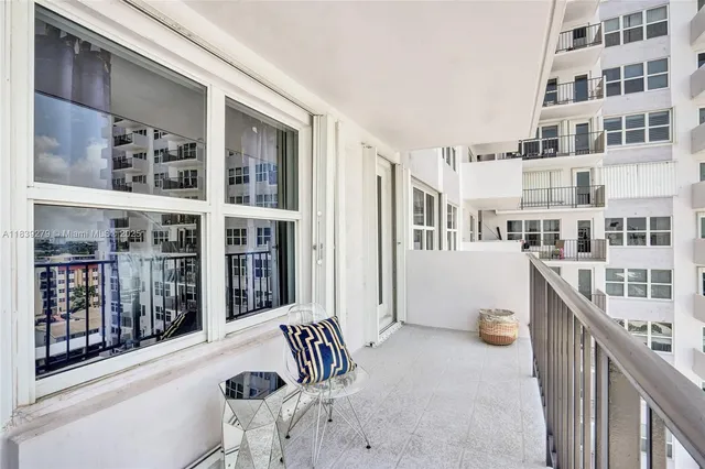 a view of a balcony with an outdoor space