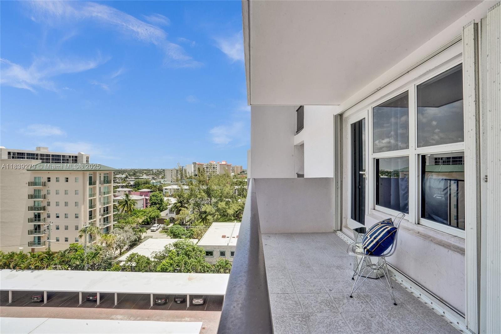 405 North Ocean Boulevard, Unit 815 Pompano Beach, FL 33062 - Photo 23 of 41 a view of a balcony with an outdoor space