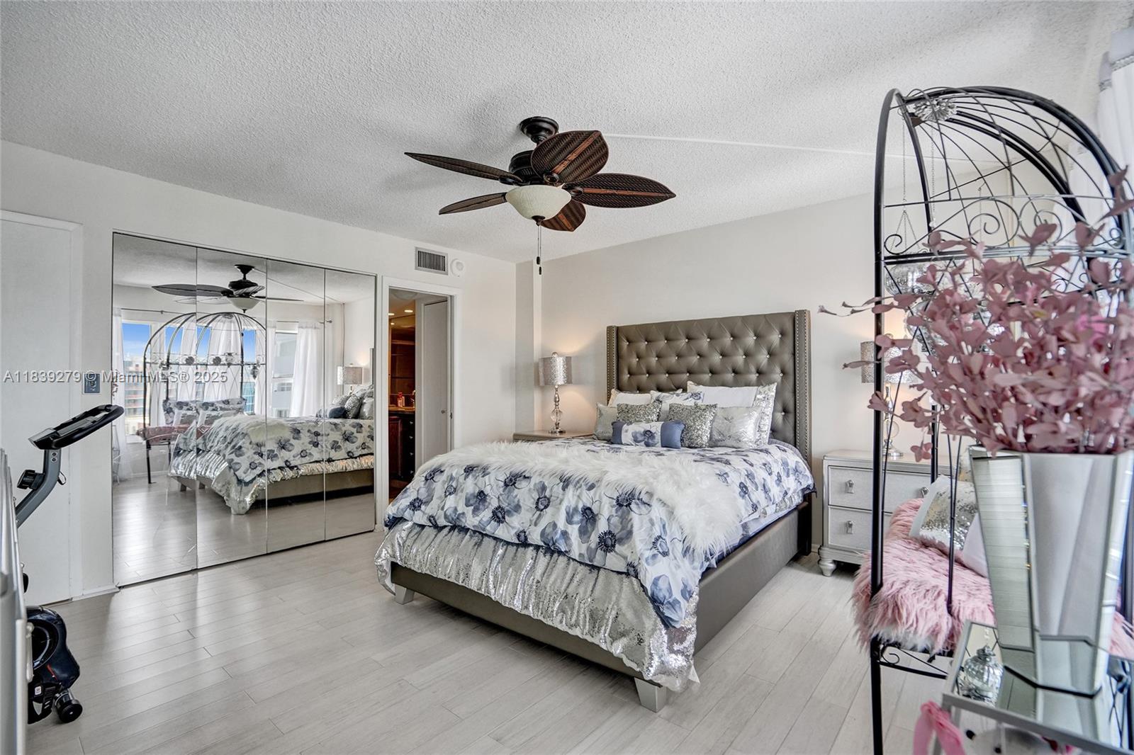 405 North Ocean Boulevard, Unit 815 Pompano Beach, FL 33062 - Photo 30 of 41 a bedroom with a bed couch and window