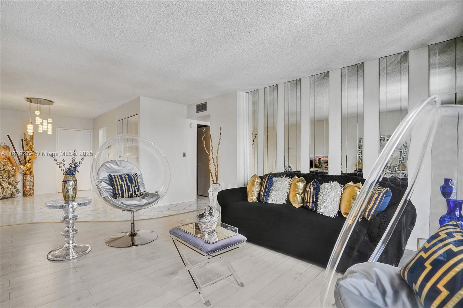 405 North Ocean Boulevard, Unit 815 Pompano Beach, FL 33062 - Photo 7 of 41 a living room with furniture