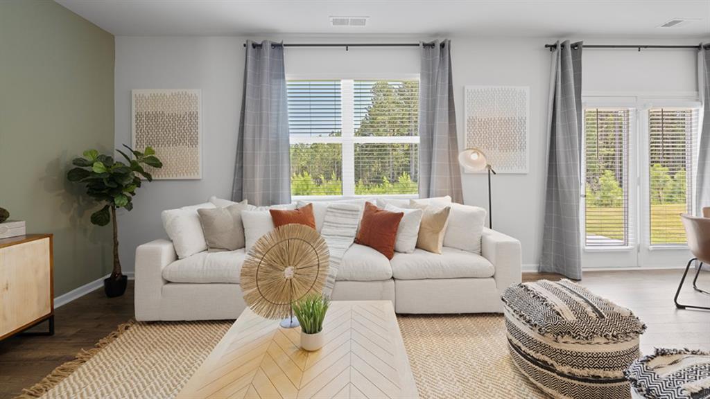 5541 Donamire Way Fairburn, GA 30213 - Photo 14 of 71 a living room with furniture and a large window