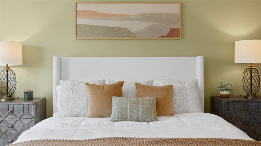 5541 Donamire Way Fairburn, GA 30213 - Photo 24 of 71 a bedroom with a bed and painting on the wall