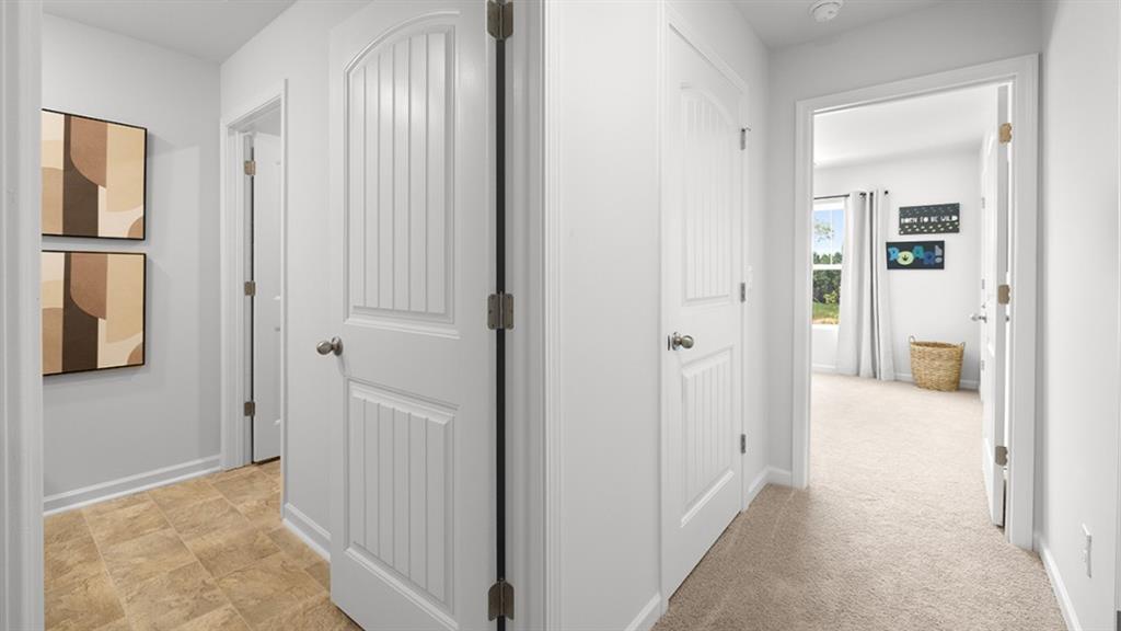 5541 Donamire Way Fairburn, GA 30213 - Photo 35 of 71 a view of a hallway with wooden floor