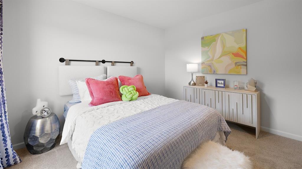 5541 Donamire Way Fairburn, GA 30213 - Photo 38 of 71 a bedroom with a bed and painting on the wall