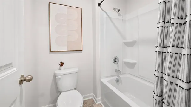 a view of a house with sitting area and garden