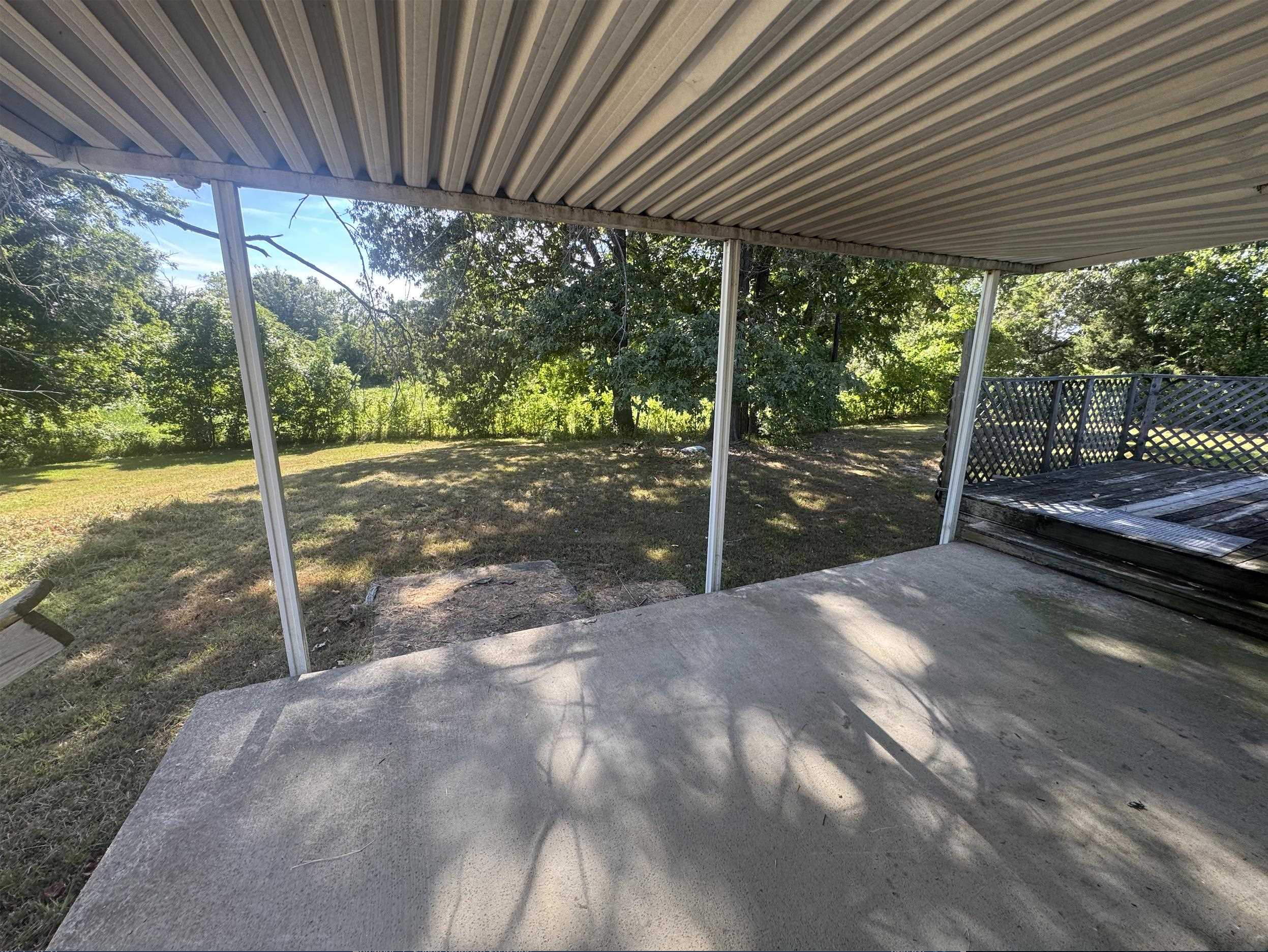 2847 Holly Grove Road Covington, TN 38019 - Photo 7 of 7 View of patio featuring a deck
