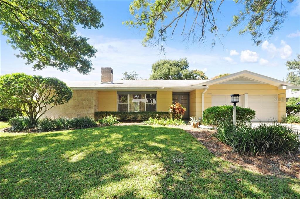 415 London Road Winter Park, FL 32792 - Photo 1 of 1 a front view of a house with a yard