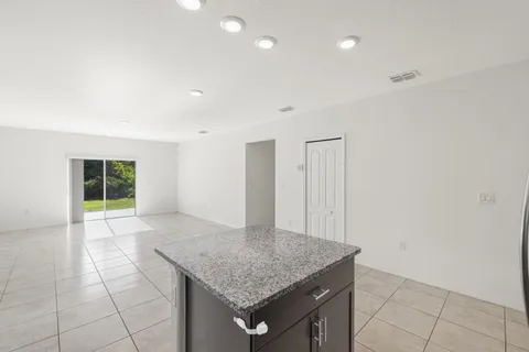 a view of kitchen island with wooden floor