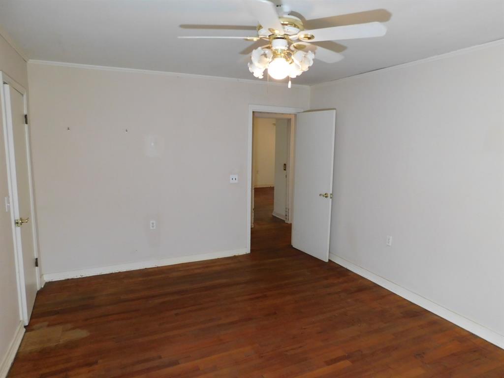 24044 Highway 157 Springhill, LA 71075 - Photo 34 of 40 wooden floor in an empty room