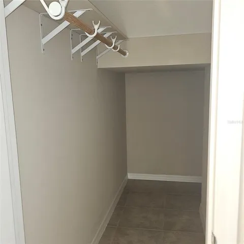 a view of a room with rack on the wall