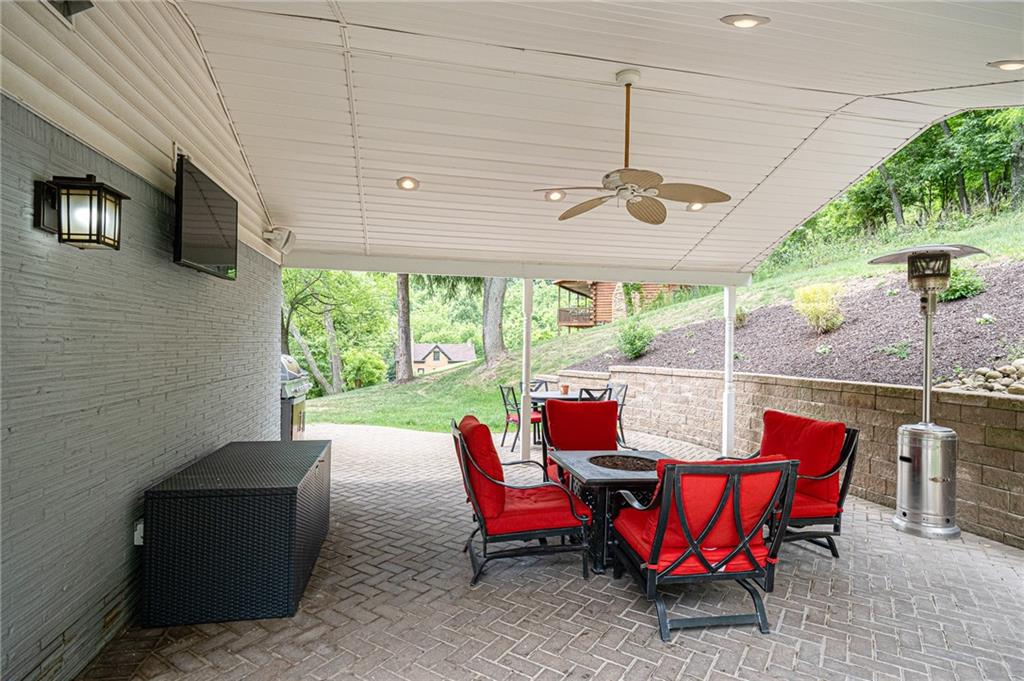 363 Jacks Run Road Pittsburgh, PA 15202 - Photo 22 of 25 Enjoy entertaining family gatherings under the covered porch!