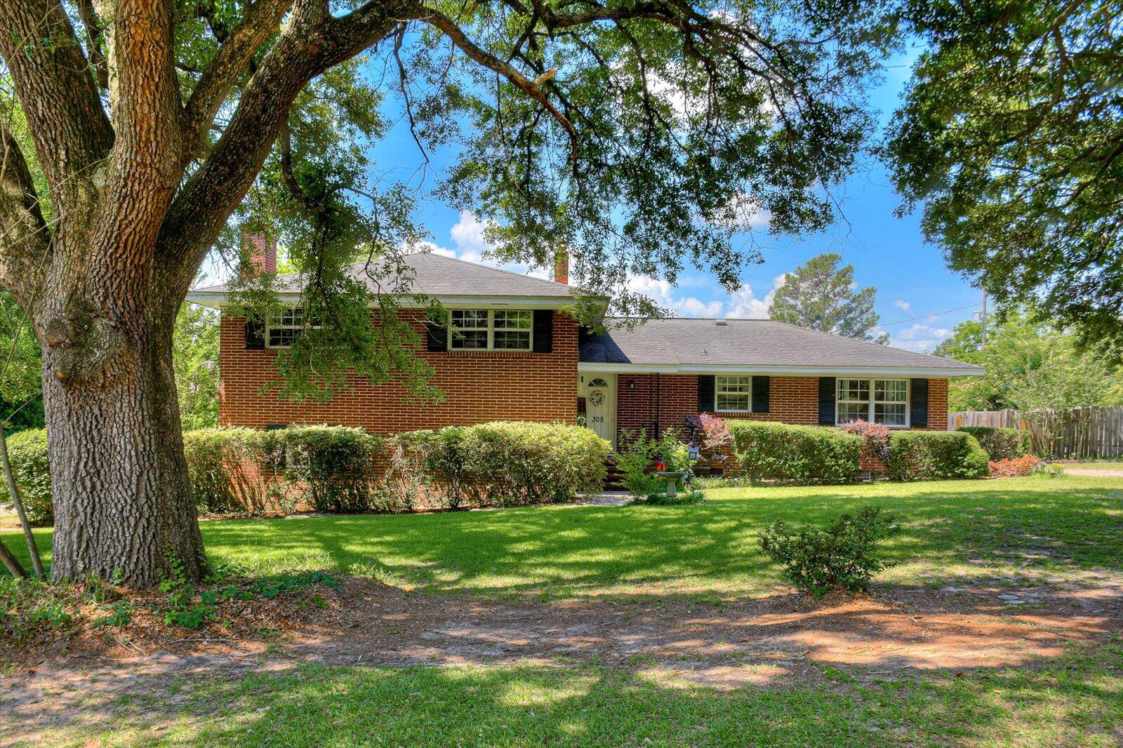 308 5th Street Jackson, SC 29831 - Photo 2 of 70 a front view of a house with garden