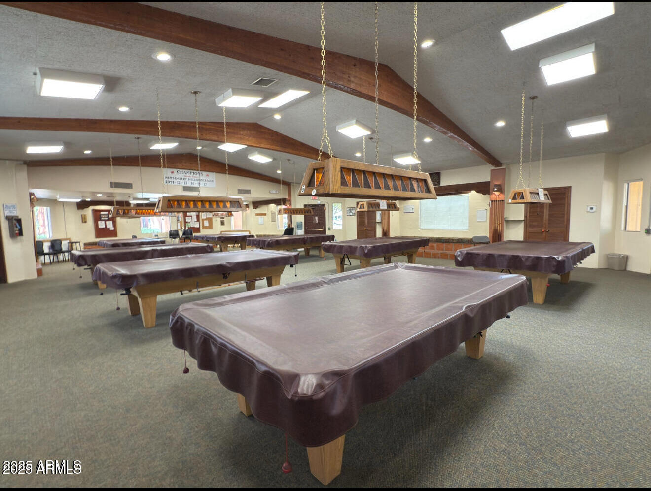 8865 East Baseline Road, Unit 614 Mesa, AZ 85209 - Photo 12 of 15 a room with lots of furniture and a chandelier