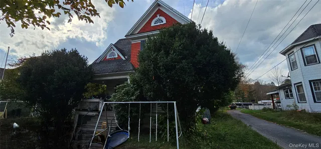 a view of street from balcony