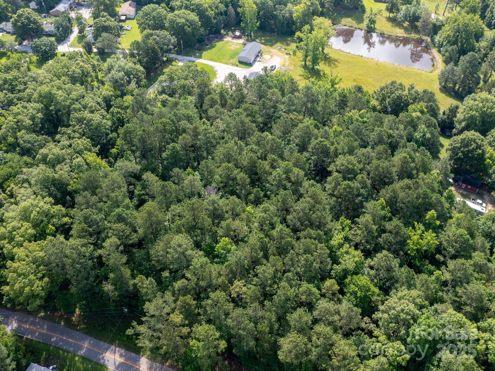 0 Powell Avenue Lancaster, SC 29720 - Photo 2 of 26 an aerial view of residential houses with outdoor space and trees