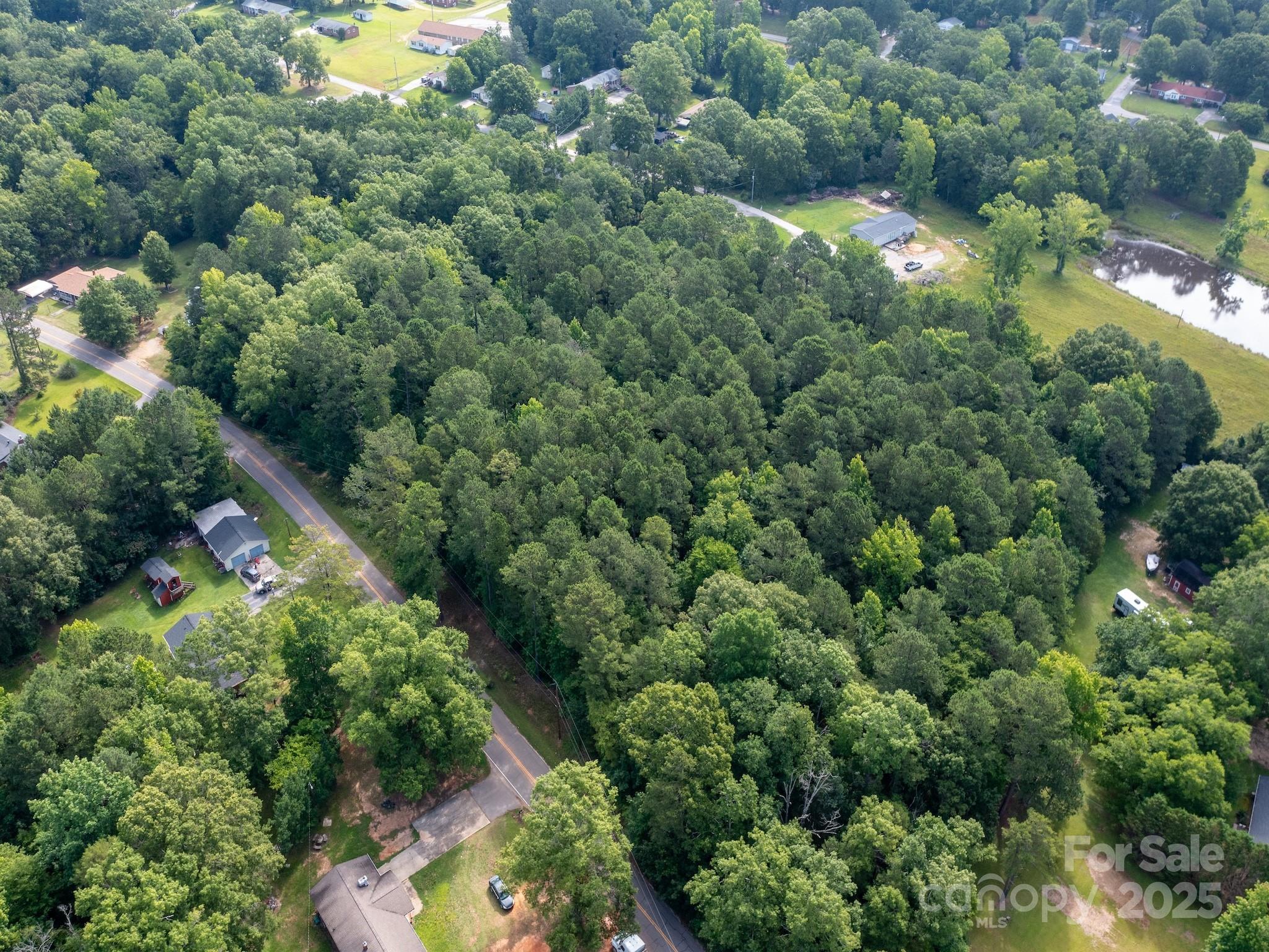 0 Powell Avenue Lancaster, SC 29720 - Photo 22 of 26 an aerial view of a house with a yard