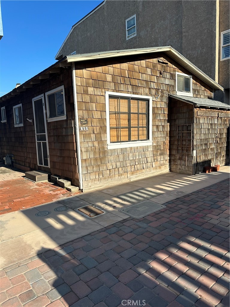 50 Surfside Avenue, Unit B Huntington Beach, CA 92649 - Photo 2 of 2 a front view of a house