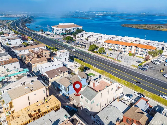 a front view of a house with parking